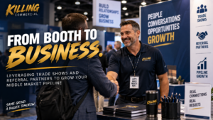 ommercial insurance producer building relationships with prospects at a trade show to grow a middle market pipeline.