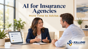 Insurance advisor discussing a client’s needs beside a laptop displaying a renewal review.