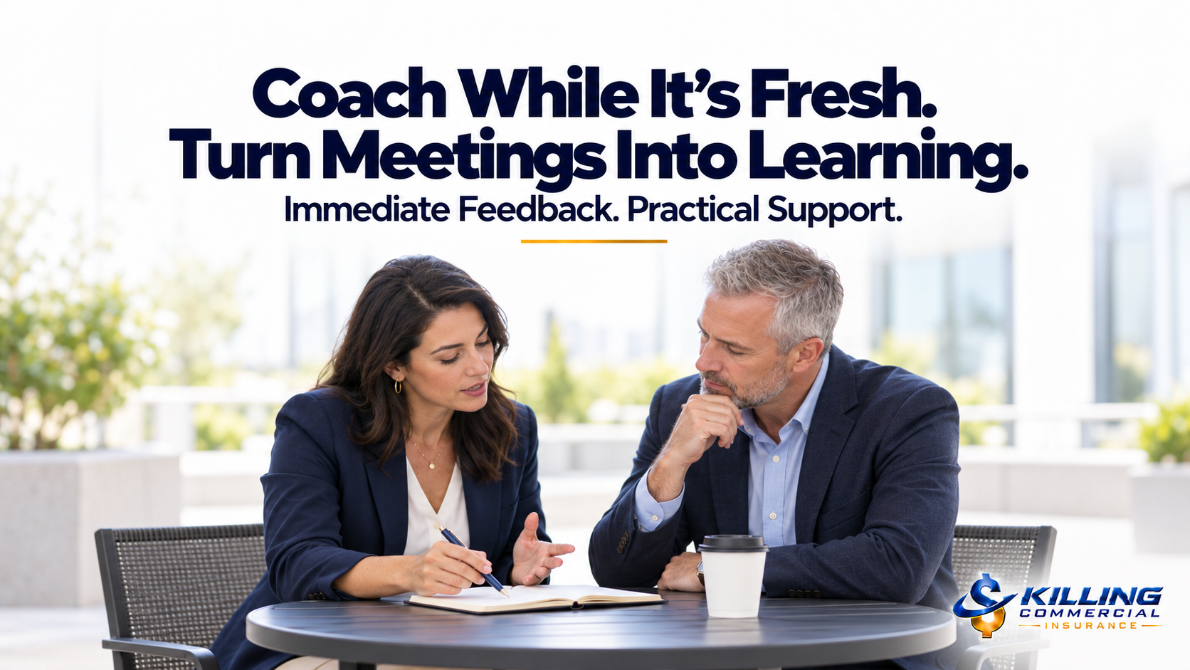 Sales coach and producer reviewing meeting notes during a curbside chat, illustrating immediate feedback and practical support.